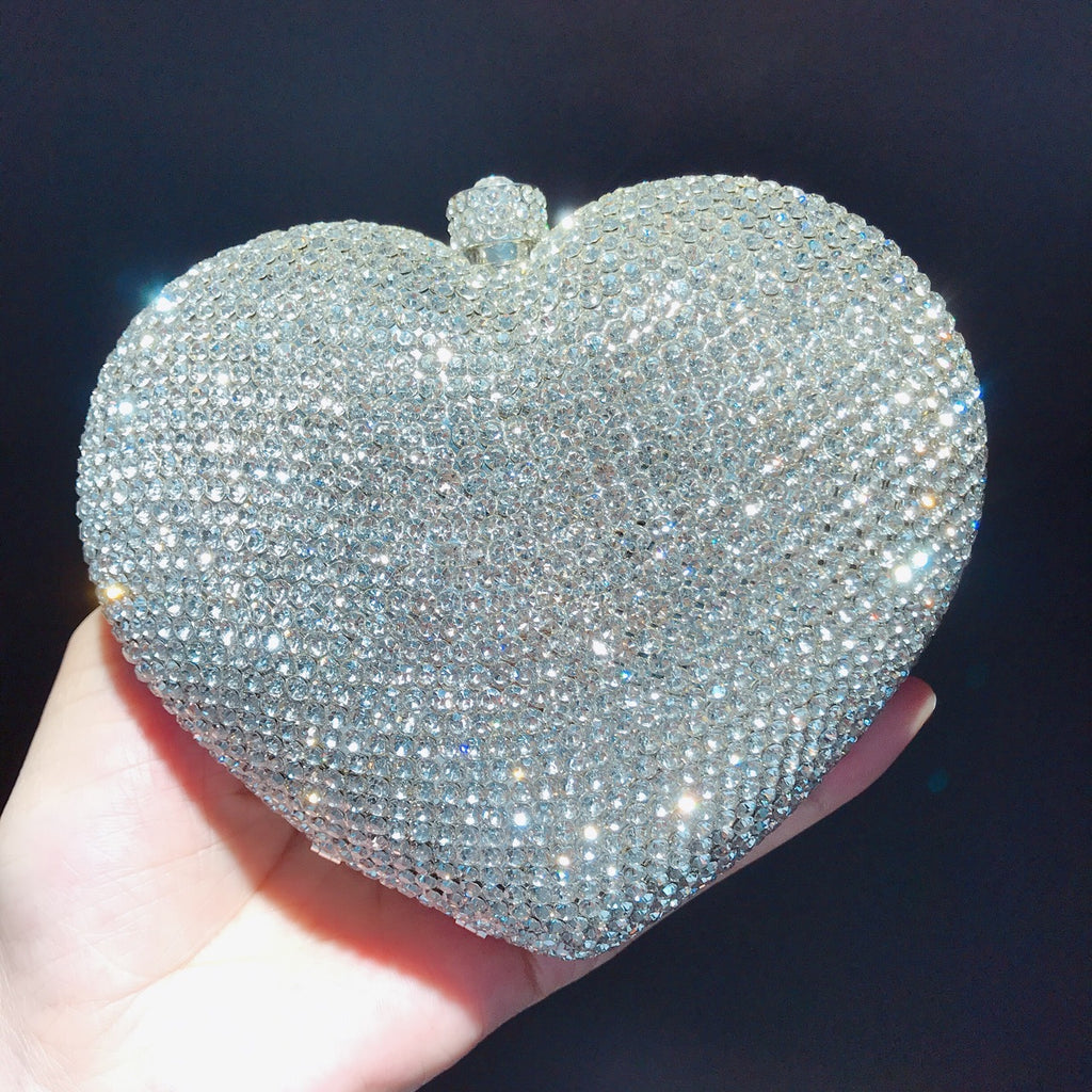 Hand Holding Heart-shaped Bag