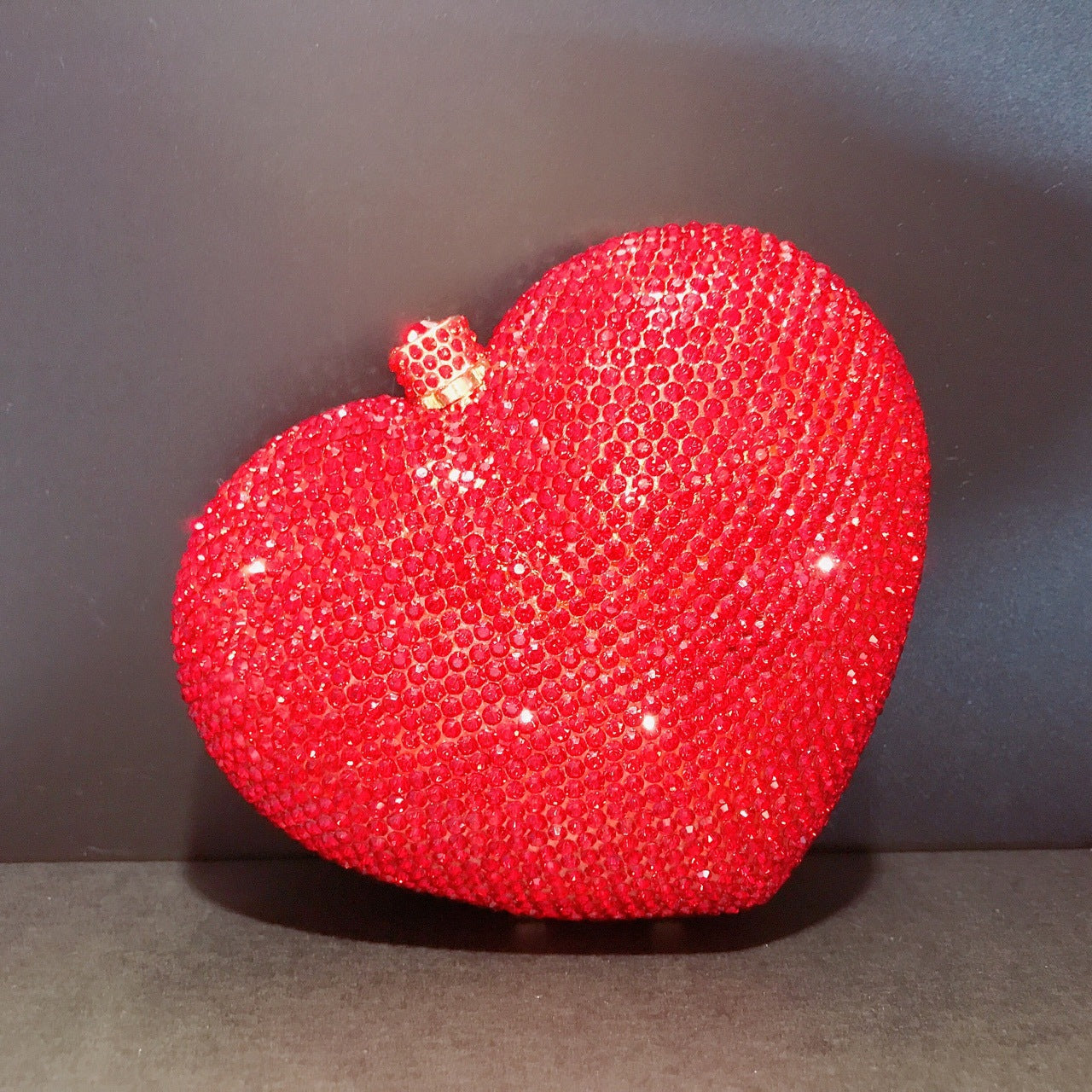Hand Holding Heart-shaped Bag
