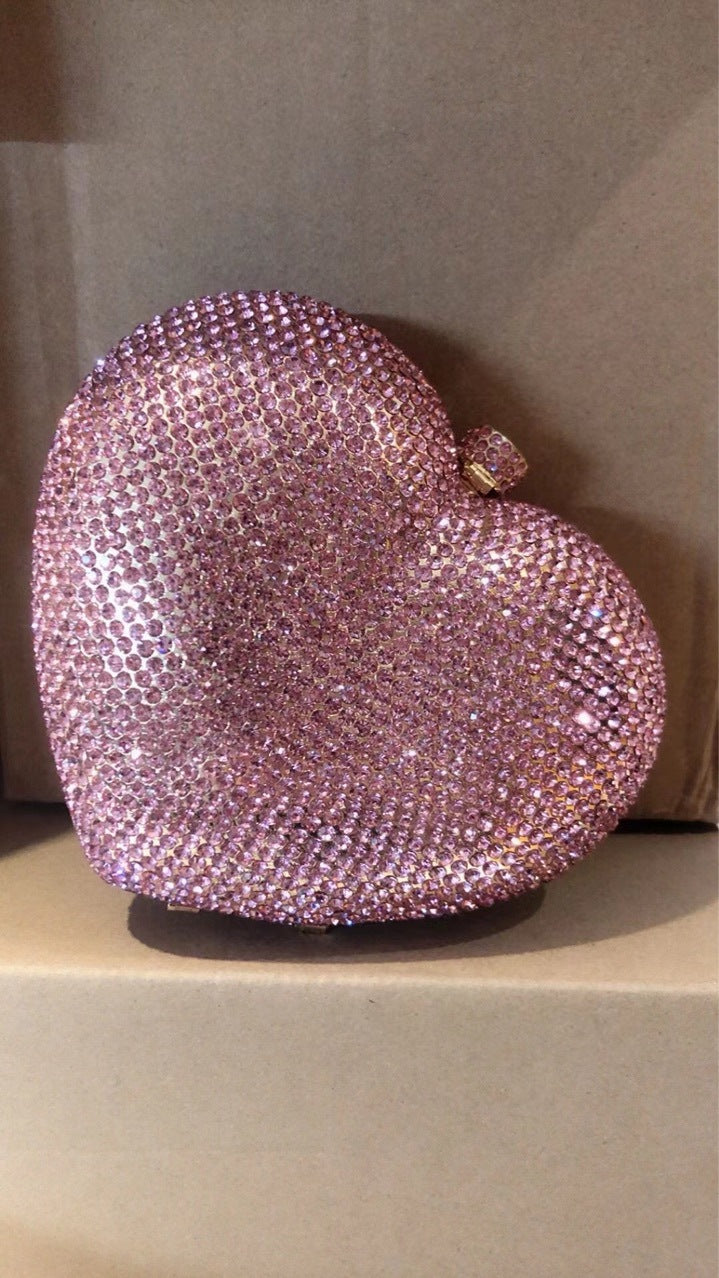 Hand Holding Heart-shaped Bag