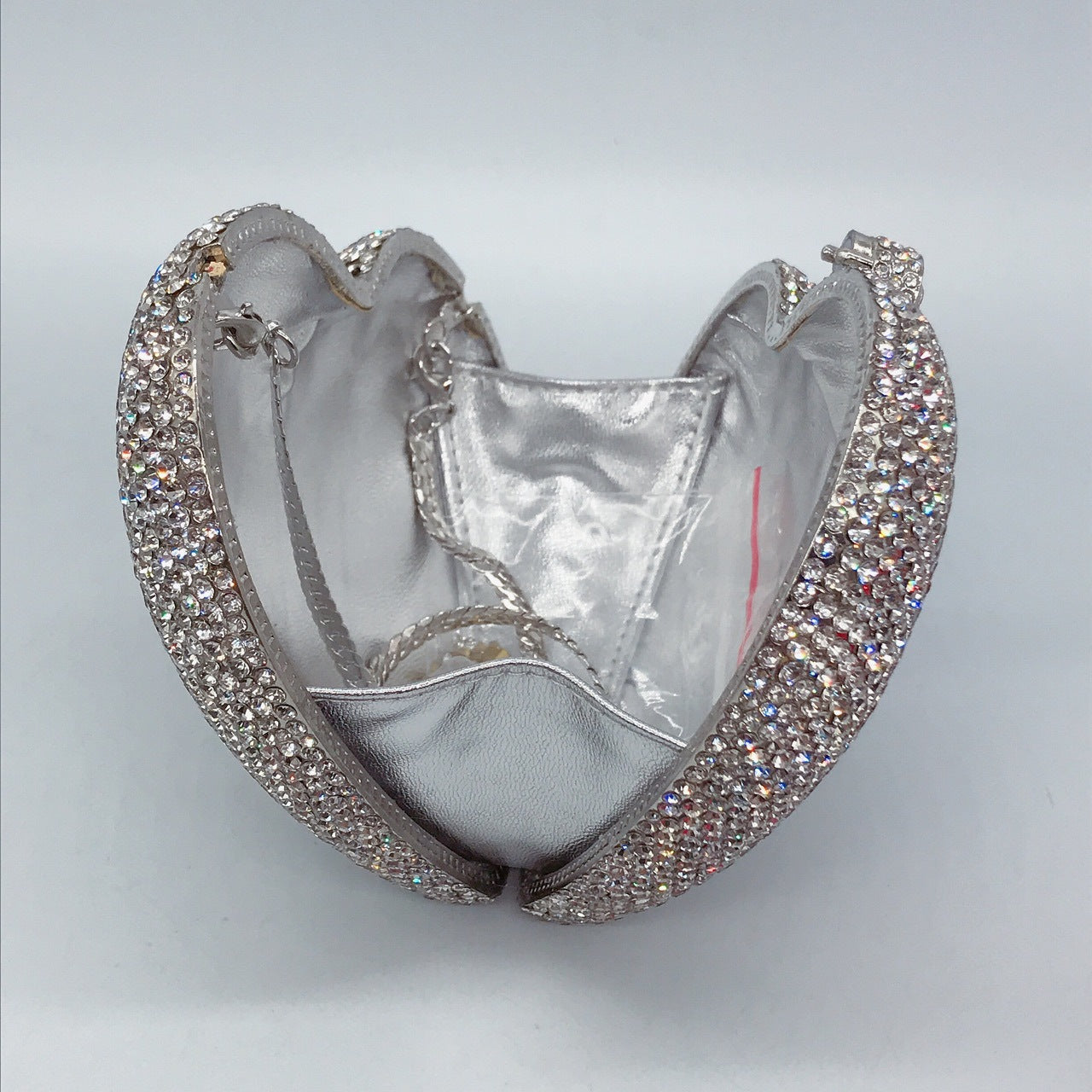 Hand Holding Heart-shaped Bag