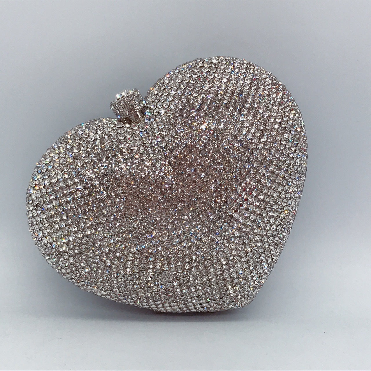 Hand Holding Heart-shaped Bag
