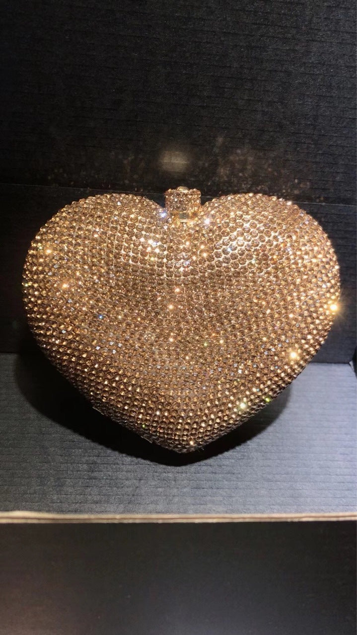 Hand Holding Heart-shaped Bag