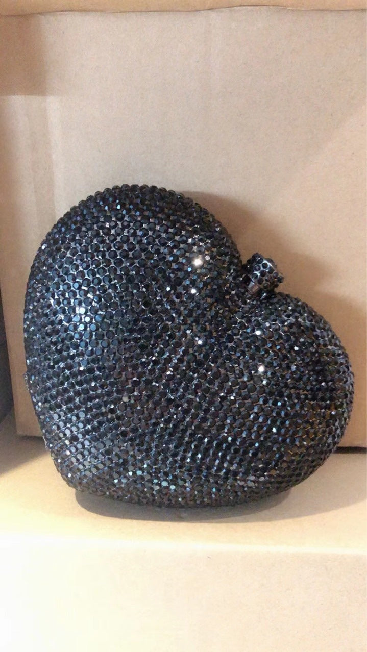 Hand Holding Heart-shaped Bag