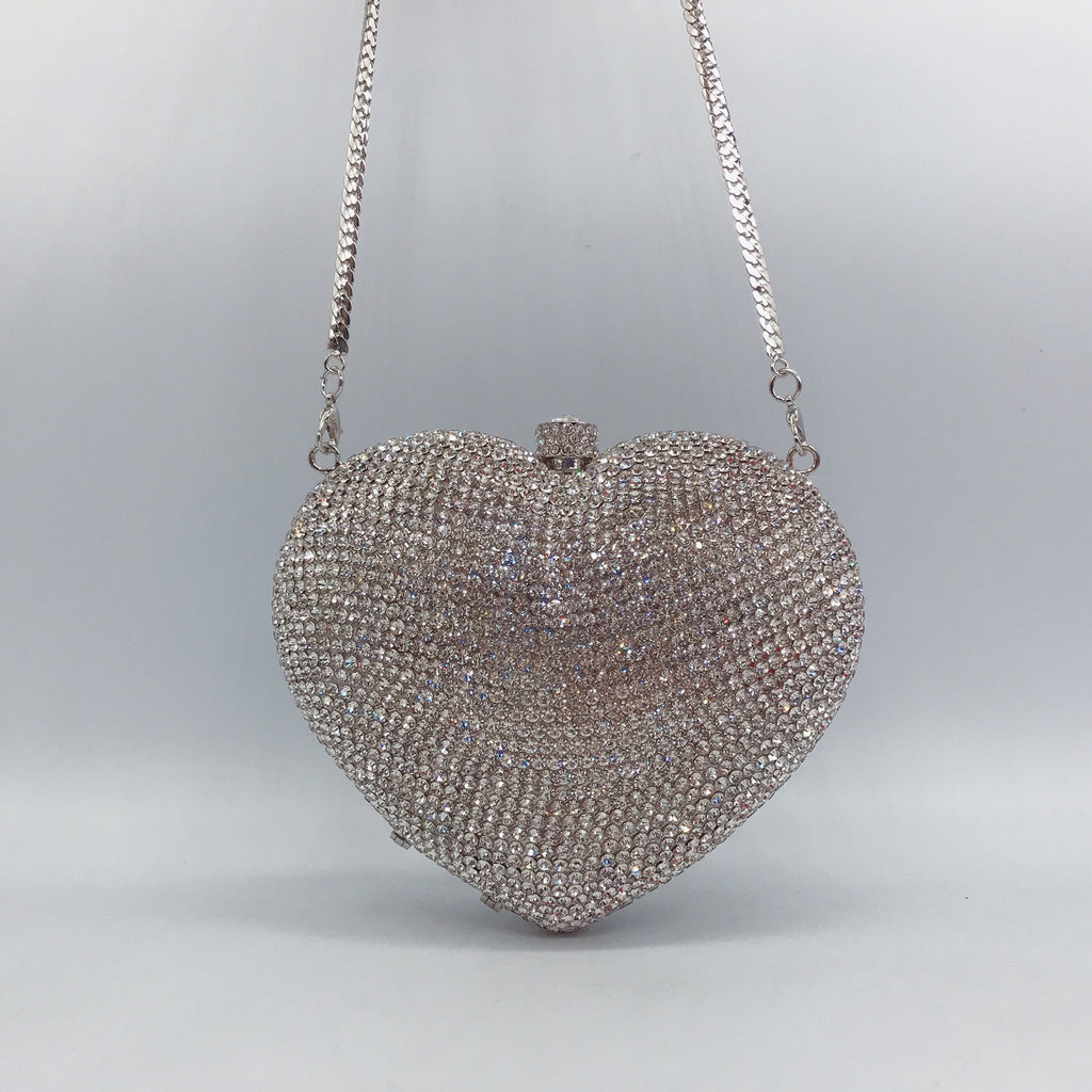Hand Holding Heart-shaped Bag